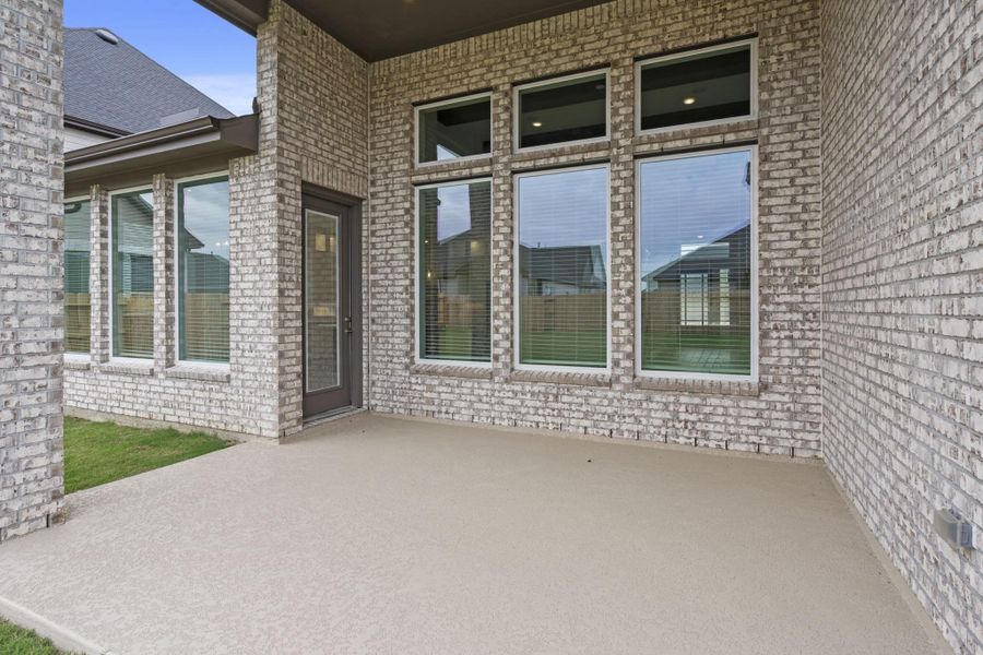 Exterior details and patio area of a home in Attwater 55s, Waller (Image 4).