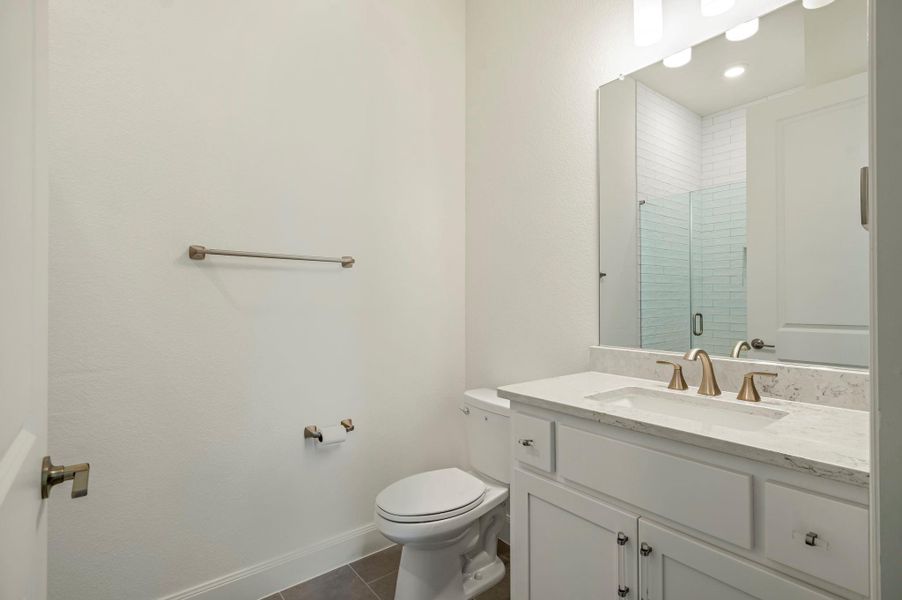 Hall Bathroom featuring single vanity, tile shower with bench and inserts Hall Bathroom featuring single vanity, tile shower with bench and inserts