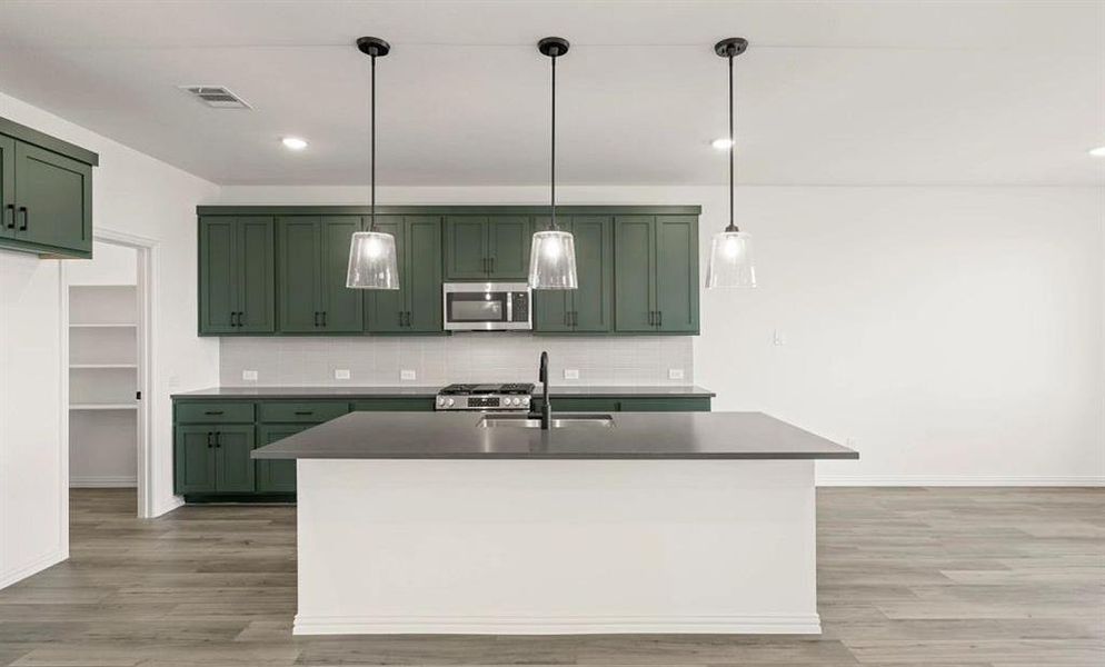 Kitchen featuring the Rosemary Collection Kitchen featuring the Rosemary Collection