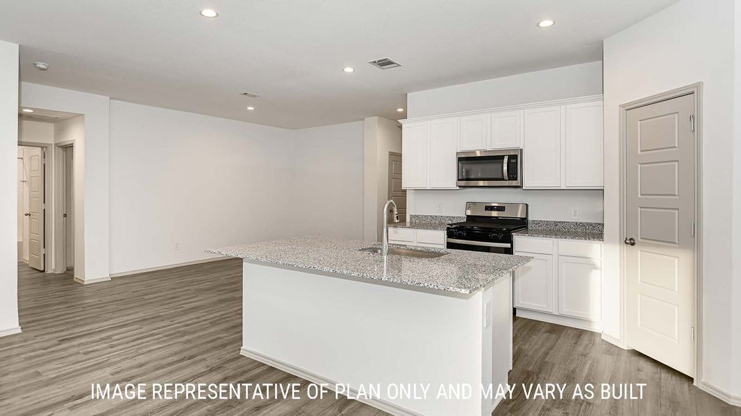 Furnished interior view inside a new home in Reserve at Mallard Lakes, Orange (Image 4).