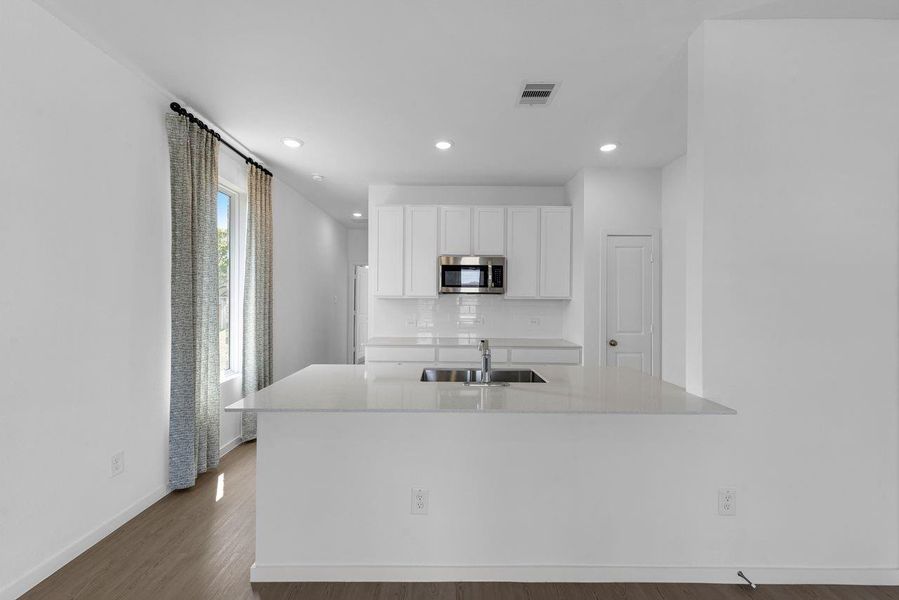 Furnished interior view inside a new home in Riverwood Ranch, Angleton (Image 9).