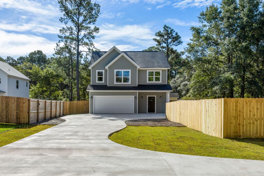 Front exterior of a new home in , Johns Island, SC, highlighting curb appeal (Image 2). Front exterior of a new home in , Johns Island, SC, highlighting curb appeal (Image 2).