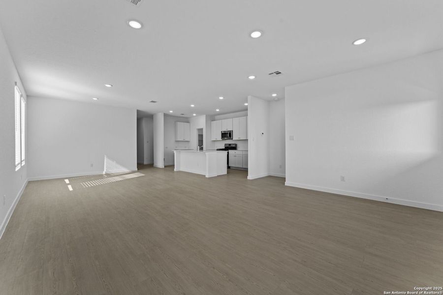 Spacious, unfurnished interior of a new home in Waterwheel: Coastline Collection, San Antonio (Image 12).