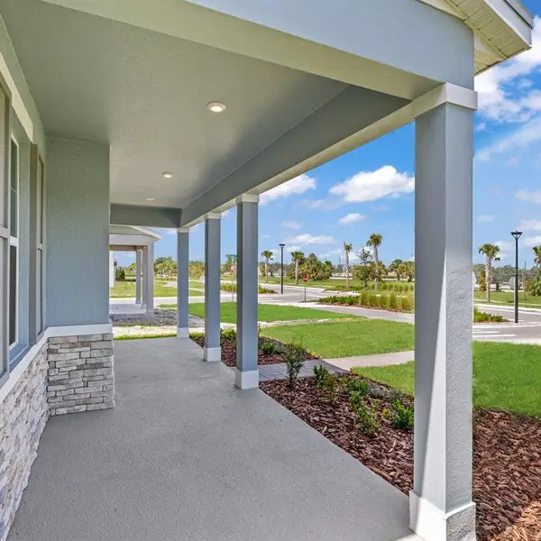 Exterior details and patio area of a home in Spring Walk at the Junction, Debary (Image 4).