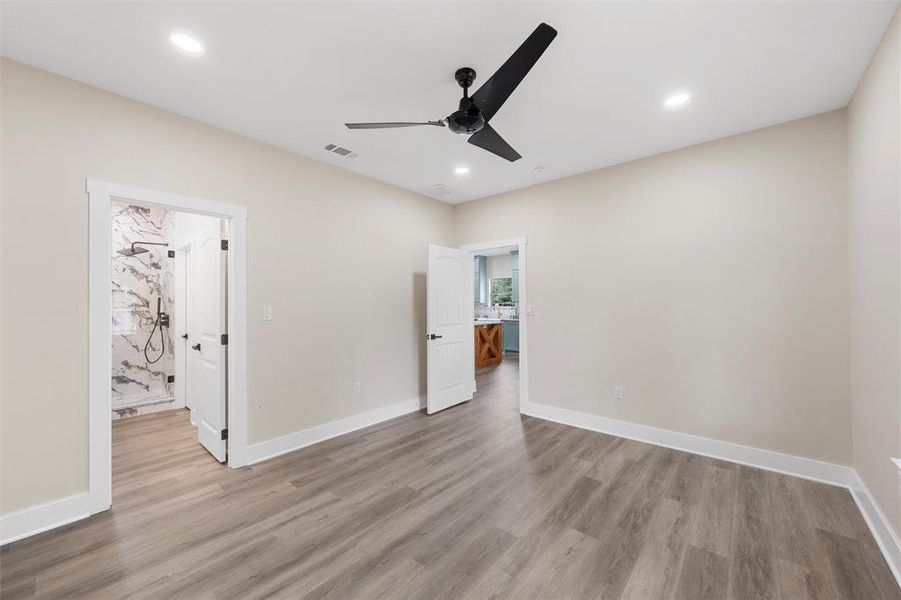 Unfurnished bedroom with light wood-style flooring, baseboards, recessed lighting, and ceiling fan