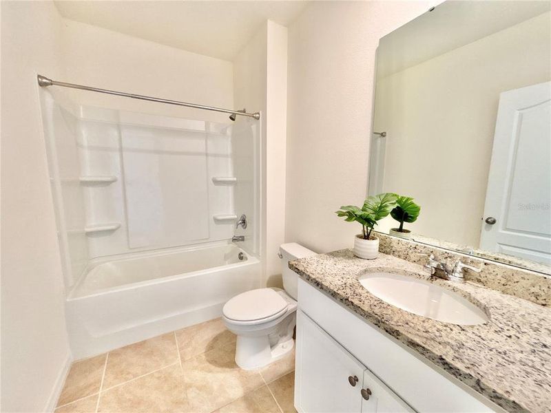 Furnished interior view inside a new home in Cascades, Davenport (Image 7).