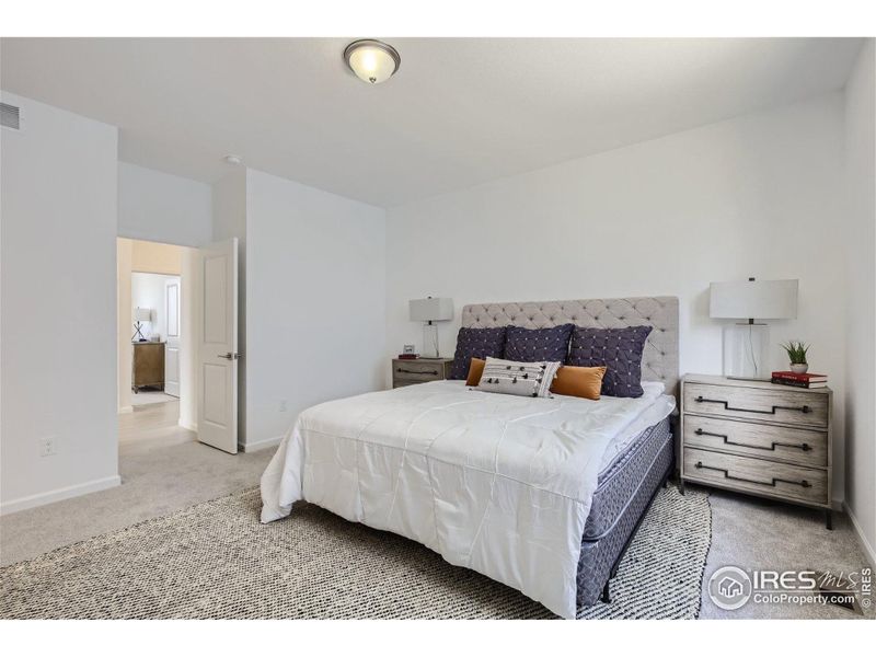 Primary bedroom *Photo not of actual home, but same floorplan and style* Primary bedroom *Photo not of actual home, but same floorplan and style*