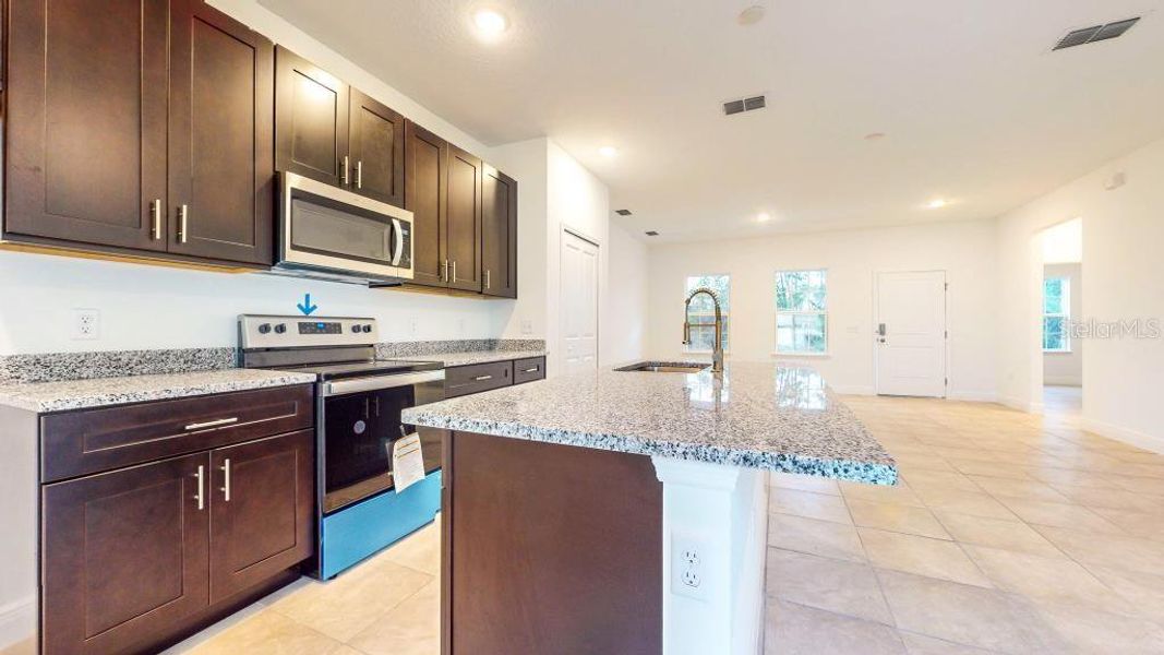 Furnished interior view inside a new home in , Dunnellon (Image 10).