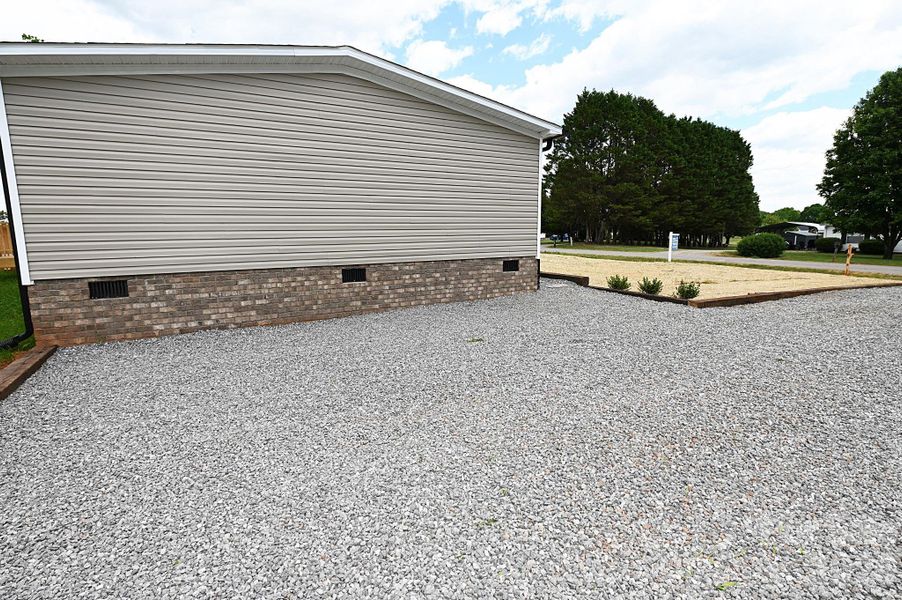 Exterior details and patio area of a home in , Stony Point (Image 24).