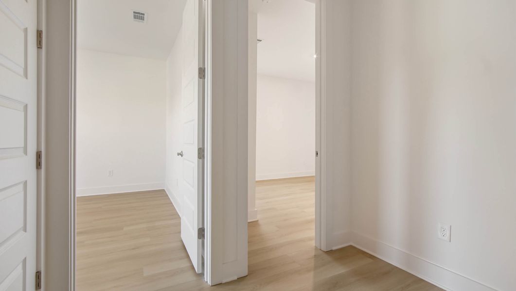 Representative unfurnished interior of a home built from the Ava by D.R. Horton in Parkside, Santa Rosa Beach (Image 39).