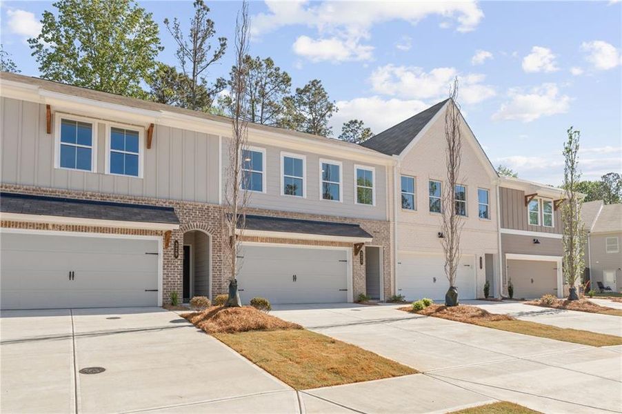 Front exterior of a new home in Cherokee Township, Acworth, GA, highlighting curb appeal (Image 19).