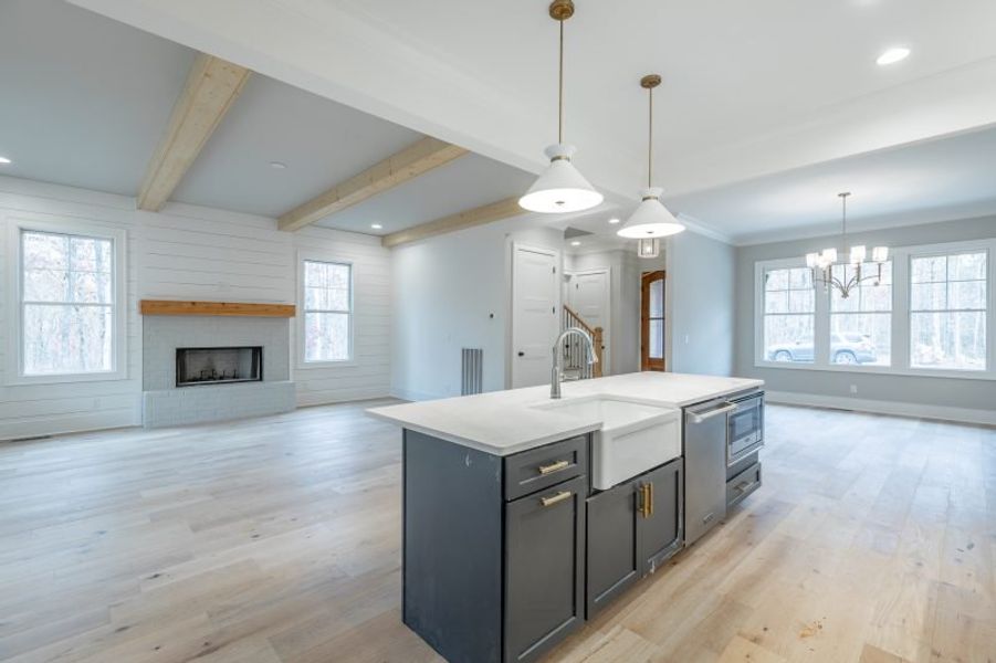 Representative furnished interior of a home built from the Carolina A by Riverstone Construction, LLC in Jasper Highlands, Guild (Image 7).