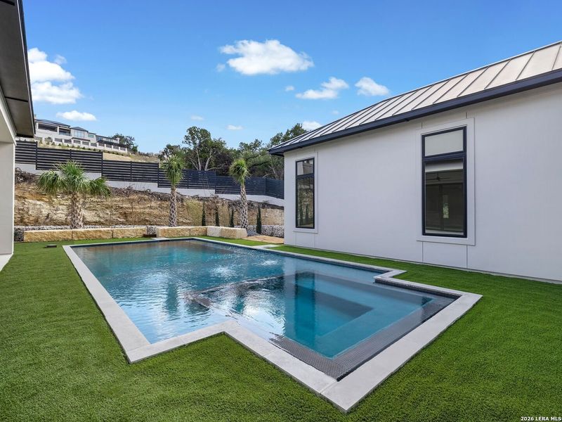 Exterior details and patio area of a home in , San Antonio (Image 38).
