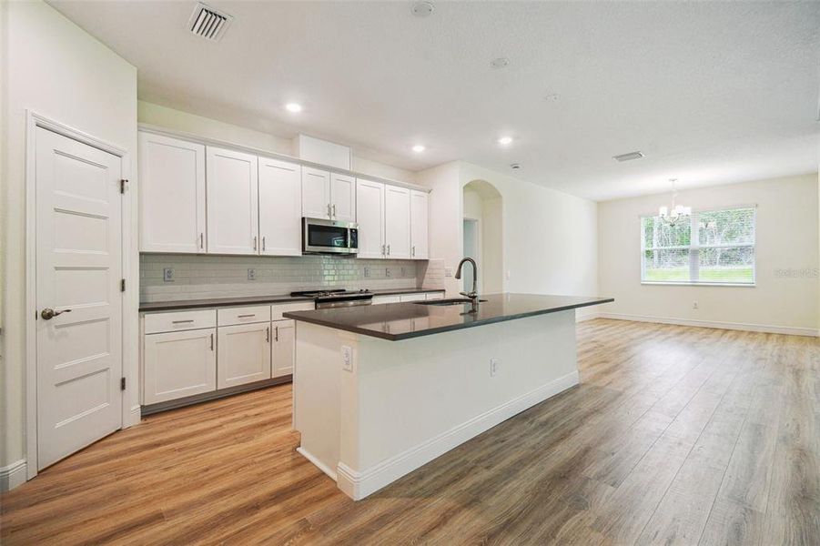Furnished interior view inside a new home in Hidden Ridge, New Port Richey (Image 11).