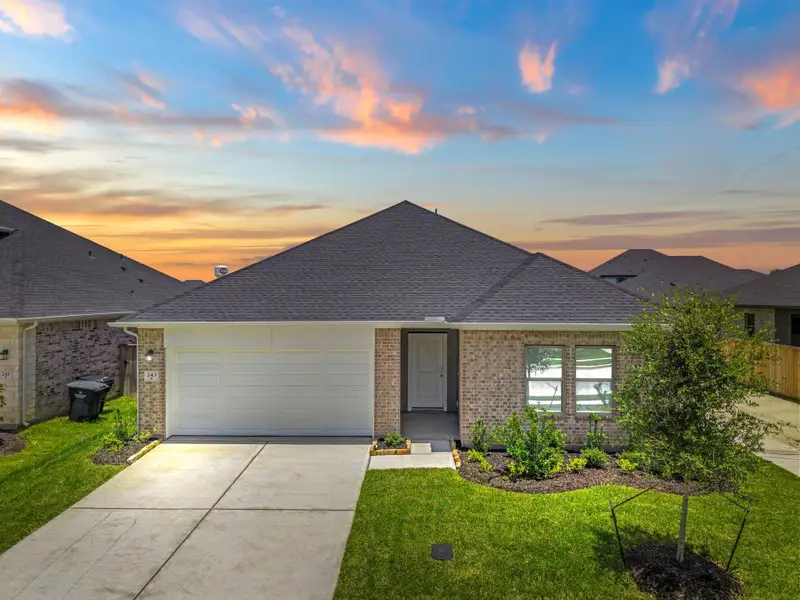 Front exterior of a new home in Laurel Landing, Alvin, TX, highlighting curb appeal (Image 21).