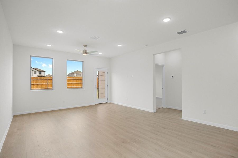 Living Room in the Magnolia home plan by Trophy Signature Homes – REPRESENTATIVE PHOTO