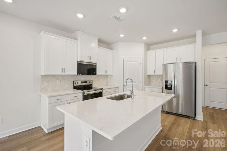 Photo is not of the actual home, but is an inspirational photo of builder’s model home and may depict options, furnishings, and/or decorator features that are not included Photo is not of the actual home, but is an inspirational photo of builder’s model home and may depict options, furnishings, and/or decorator features that are not included