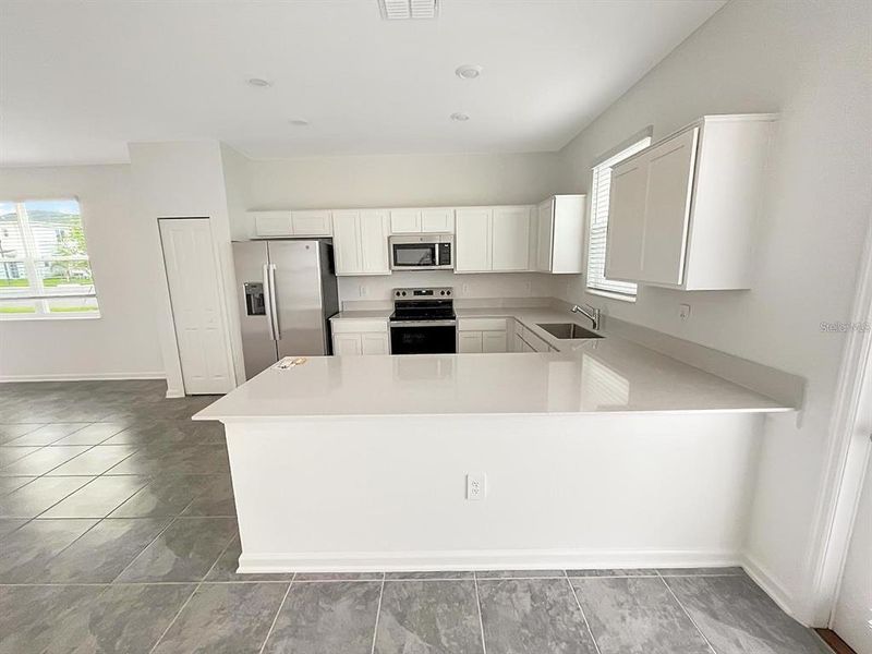 Furnished interior view inside a new home in , Davenport (Image 3).