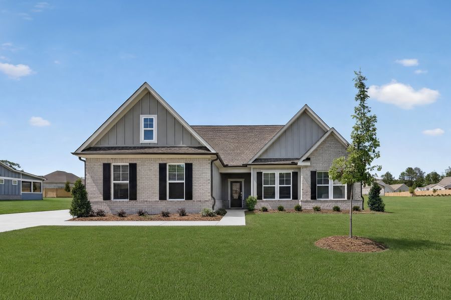 Front exterior of a new home in Riverbend North, Bonaire, GA, highlighting curb appeal (Image 1). Front exterior of a new home in Riverbend North, Bonaire, GA, highlighting curb appeal (Image 1).
