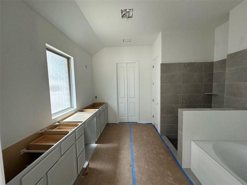 Primary Bath with dual vanities, garden tub & walk-in shower Primary Bath with dual vanities, garden tub & walk-in shower