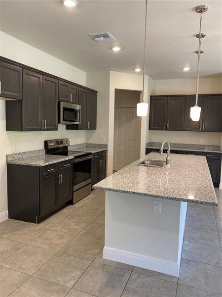 Furnished interior view inside a new home in , North Port (Image 3).