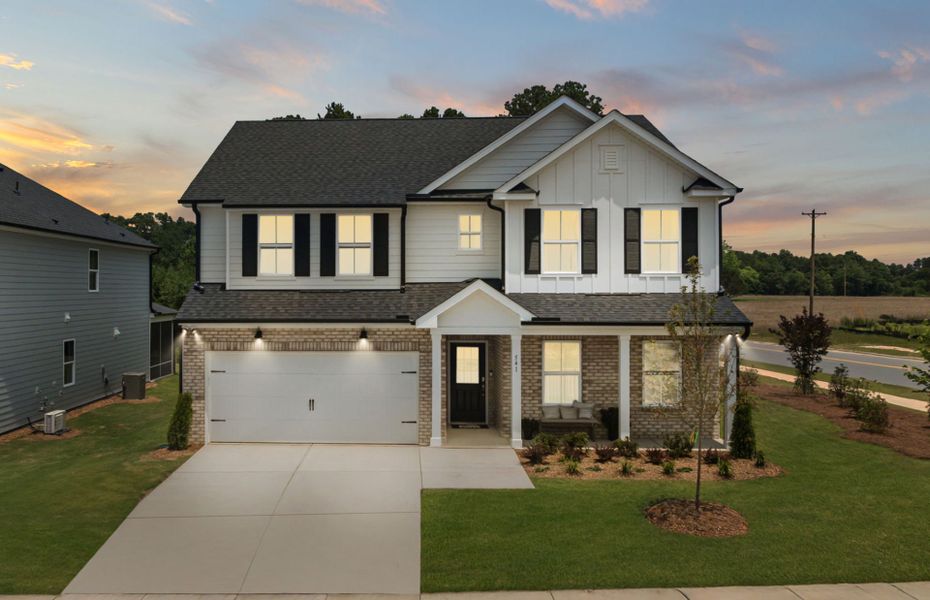 Front exterior of a new home in Providence Oaks, Fuquay Varina, NC, highlighting curb appeal (Image 20).