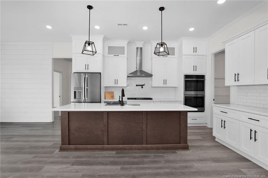sample kitchen design featuring upgrades