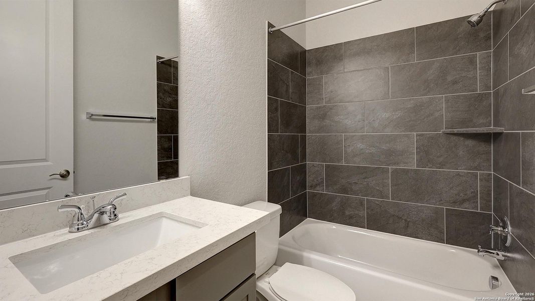 Furnished interior view inside a new home in Vida 50', San Antonio (Image 9).