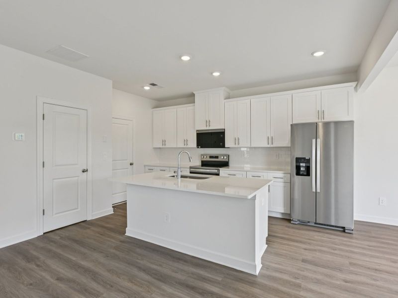 Furnished interior view inside a new home in Buffalo Ridge, Newton (Image 5).
