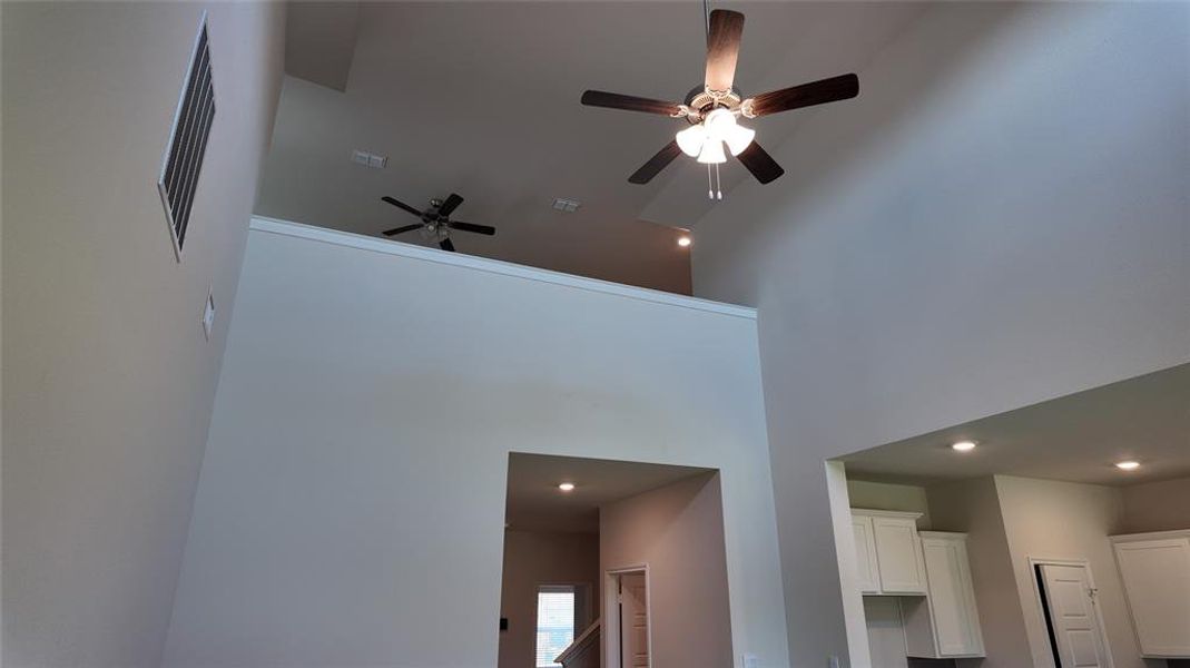 Detailed view of ceiling fan and recessed lighting