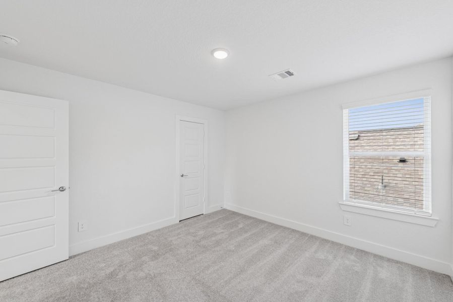 Spacious, unfurnished interior of a new home in Sorella, Tomball (Image 17).