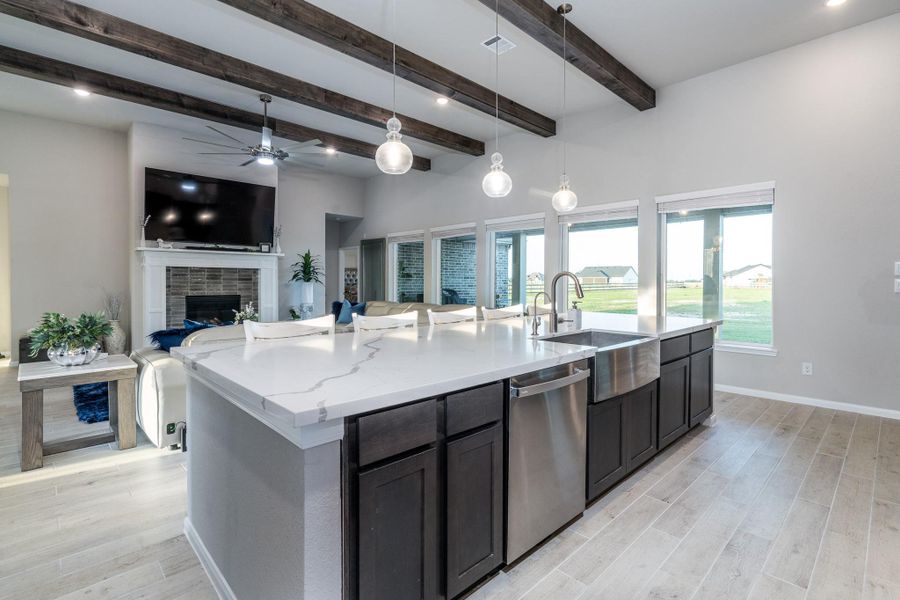 Welcoming open space between the Greatroom and the gourmet kitchen