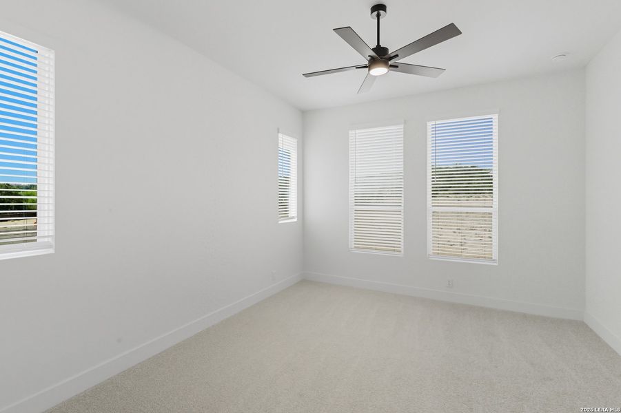Spacious, unfurnished interior of a new home in Centero at Stone Oak, San Antonio (Image 15).