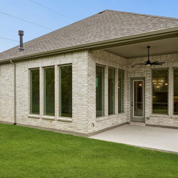 Exterior details and patio area of a home in The Parks at Wilson Creek, Celina (Image 29). Exterior details and patio area of a home in The Parks at Wilson Creek, Celina (Image 29).