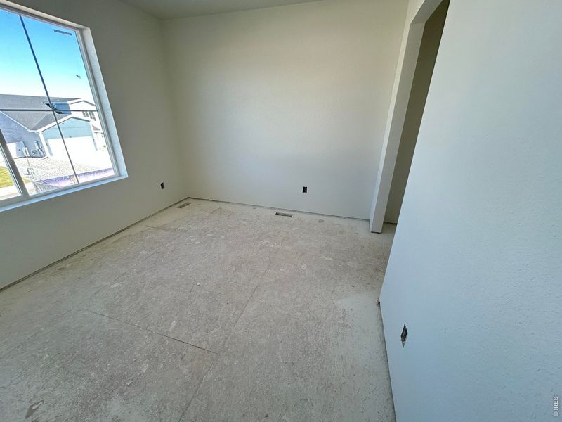 In-progress construction of a new home in Liberty Draw, Evans, CO (Image 40).