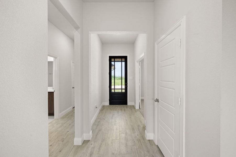 Front exterior of a new home in Still Water Lake Estates, Godley, TX, highlighting curb appeal (Image 14).