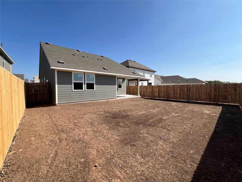 Exterior details and patio area of a home in Rolling Glen, Hutto (Image 16).