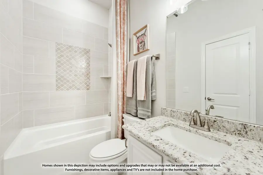 Bathroom with granite countertop vanity, tiled tub-shower combo, and decorative mosaic niche accent Bathroom with granite countertop vanity, tiled tub-shower combo, and decorative mosaic niche accent