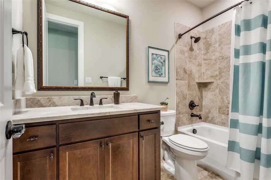 Second Full Bathroom with Taj Mahal countertops