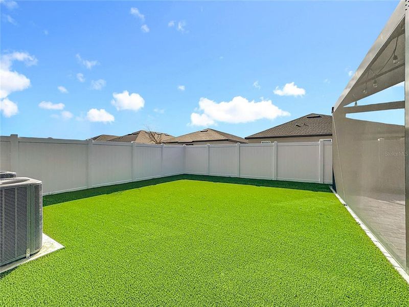 Exterior details and patio area of a home in Sunbrooke, St. Cloud (Image 31).