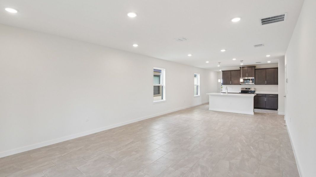 Furnished interior view inside a new home in Grasslands West, Lakeland (Image 8).