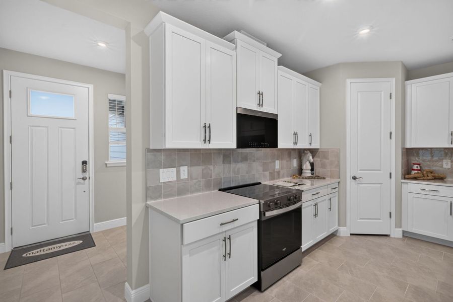 Furnished interior view inside a new home in Wellen Park, Venice (Image 7).