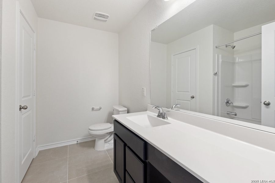 Furnished interior view inside a new home in Spanish Trails Villas, San Antonio (Image 7).