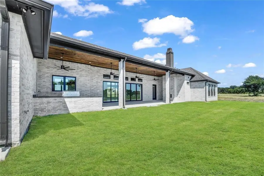 Exterior details and patio area of a home in , Aledo (Image 32).