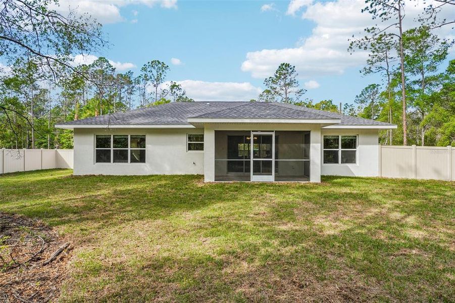 Exterior details and patio area of a home in , Citrus Springs (Image 33).