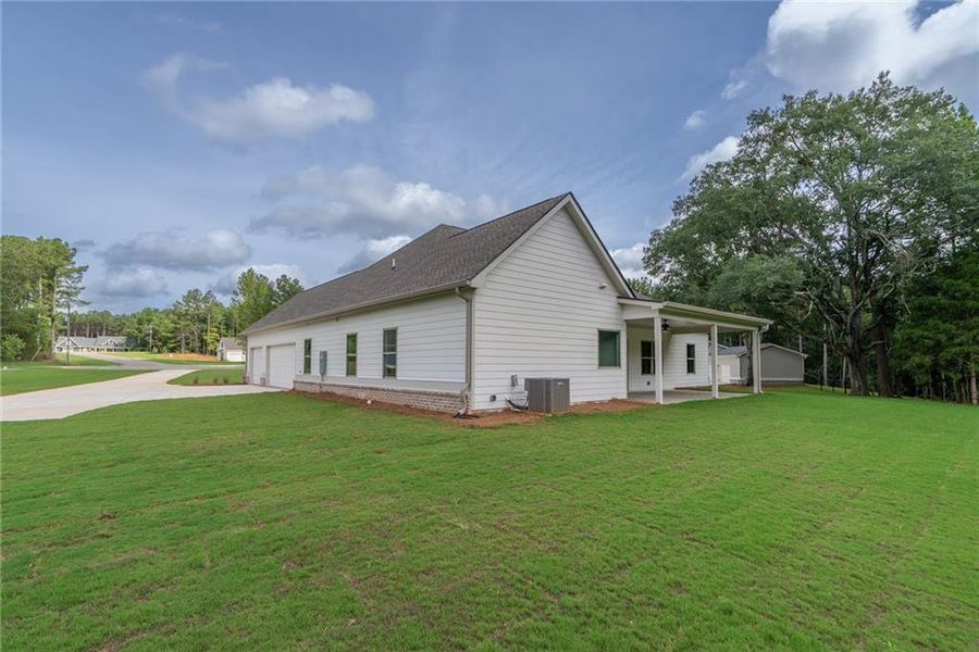 Exterior details and patio area of a home in , Social Circle (Image 24).