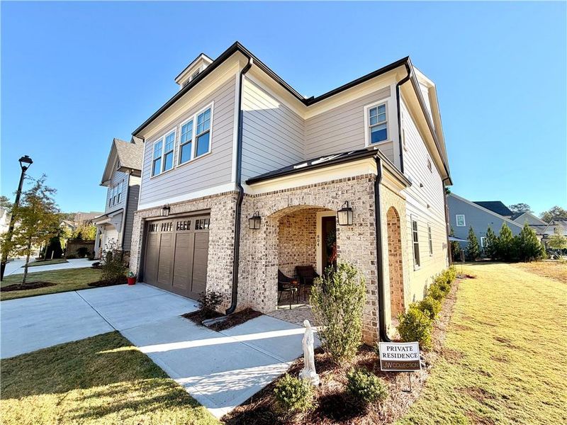 Front exterior of a new home in , Canton, GA, highlighting curb appeal (Image 23). Front exterior of a new home in , Canton, GA, highlighting curb appeal (Image 23).