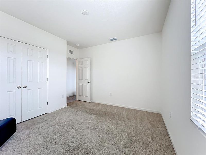 Spacious, unfurnished interior of a new home in Cypress Bay West, Palm Bay (Image 24).