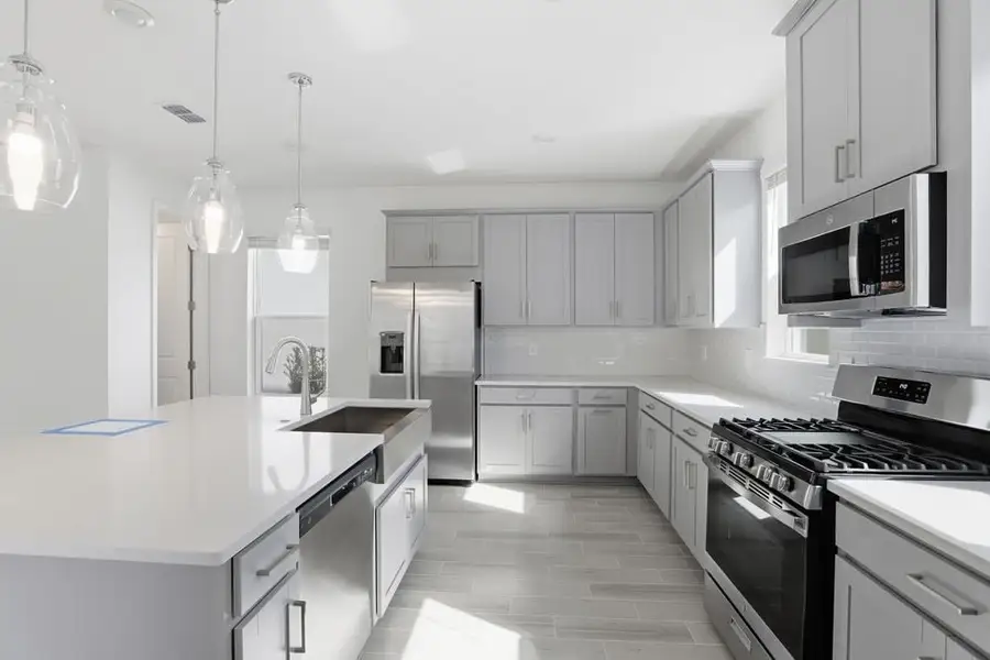 Representative furnished interior of a home built from the Ashwood by Taylor Morrison in Harvest at Ovation, Winter Garden (Image 7).