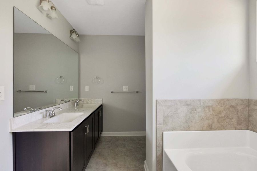 Representative furnished interior of a home built from the Springfield by Caviness & Cates Communities in Sutherland Station at Olde Liberty, Franklinton (Image 119). Representative furnished interior of a home built from the Springfield by Caviness & Cates Communities in Sutherland Station at Olde Liberty, Franklinton (Image 119).